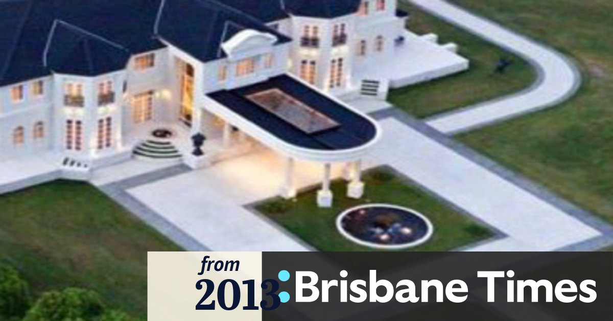 Gold Coast hinterland mansion sells for half its cost